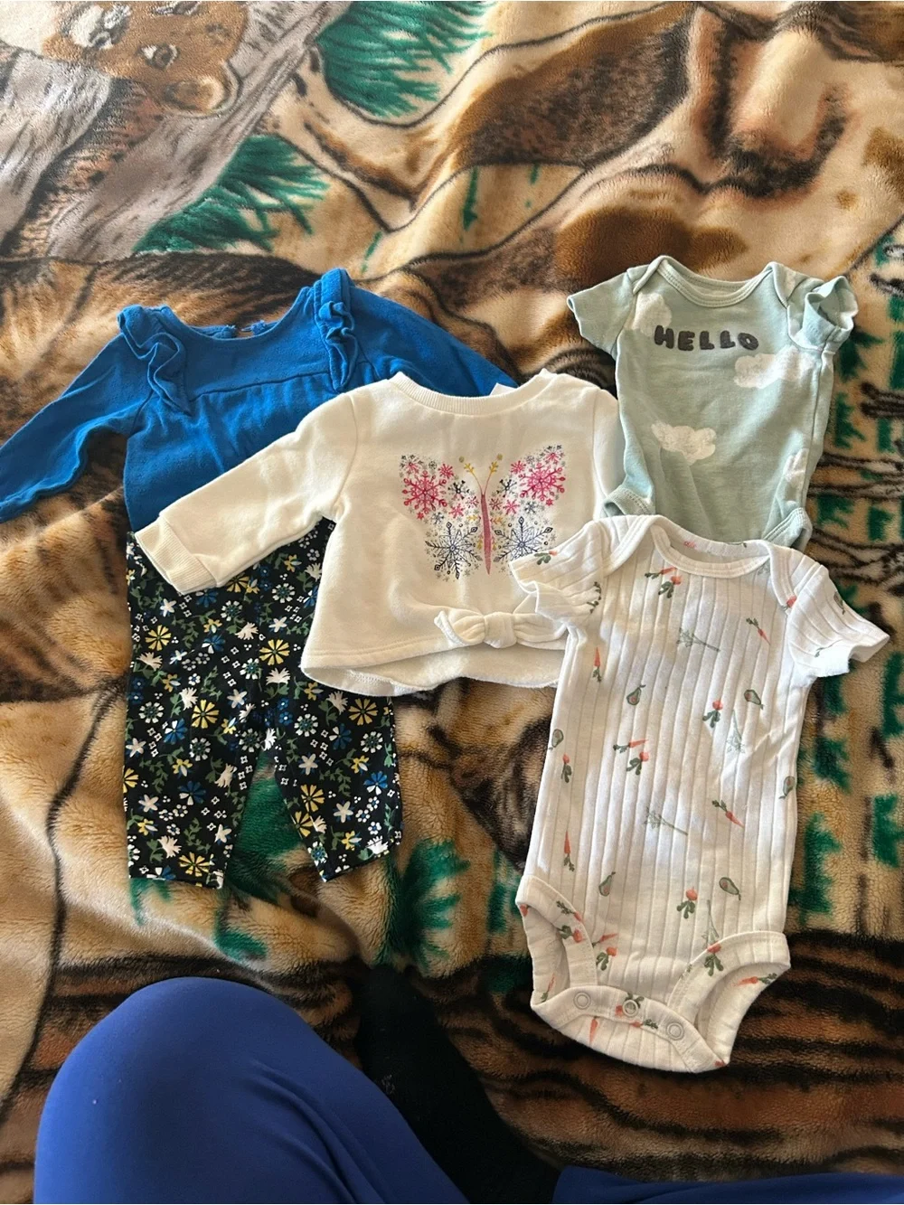 Bundle: includes a 2 piece set, a sweater and 2 onesies